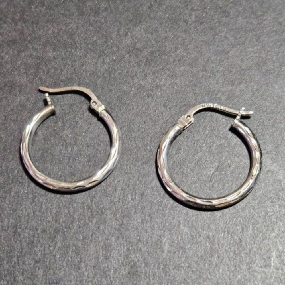 Sterling silver diamond cut hoop earrings texture